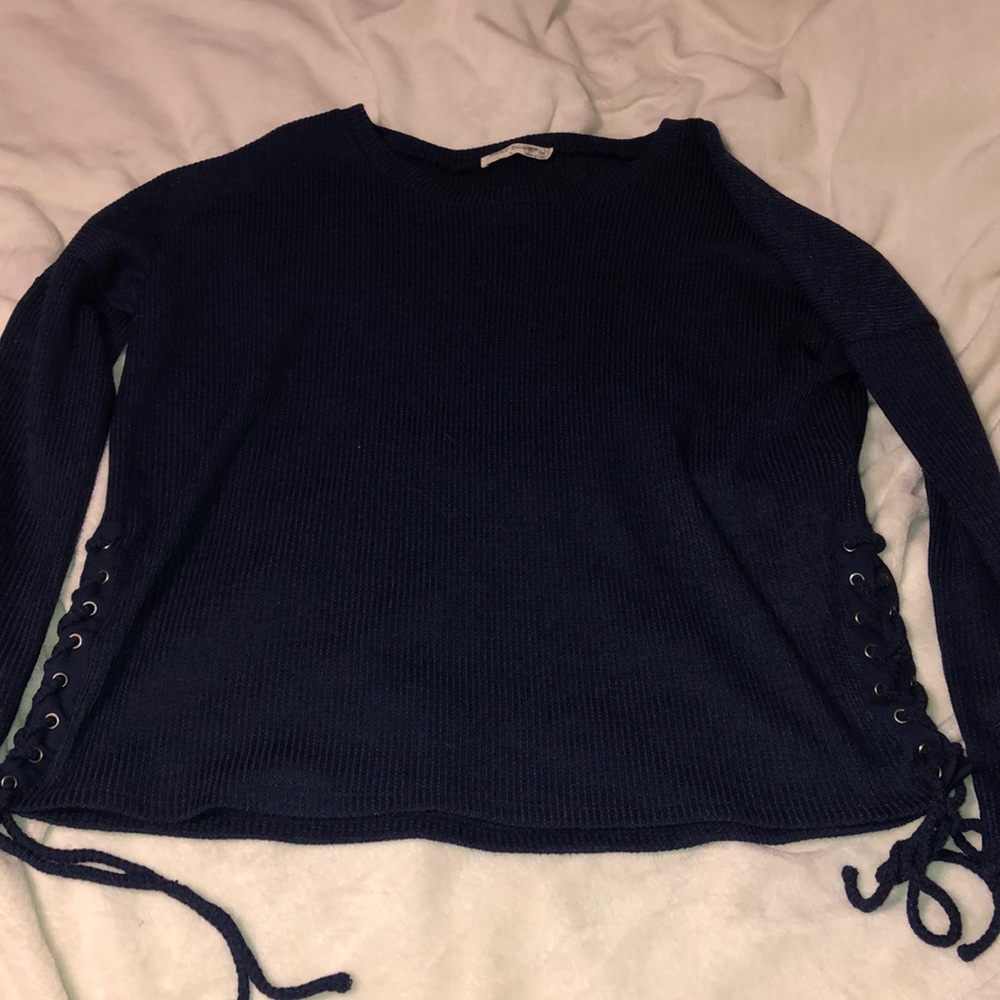 Navy blue sweater with ties at side